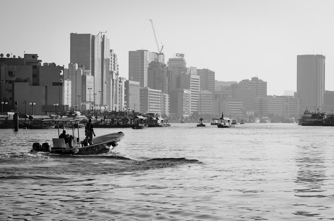 A Motorboat  Traversing the River