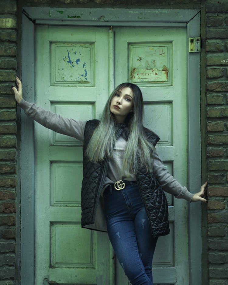 Woman Standing By The Door