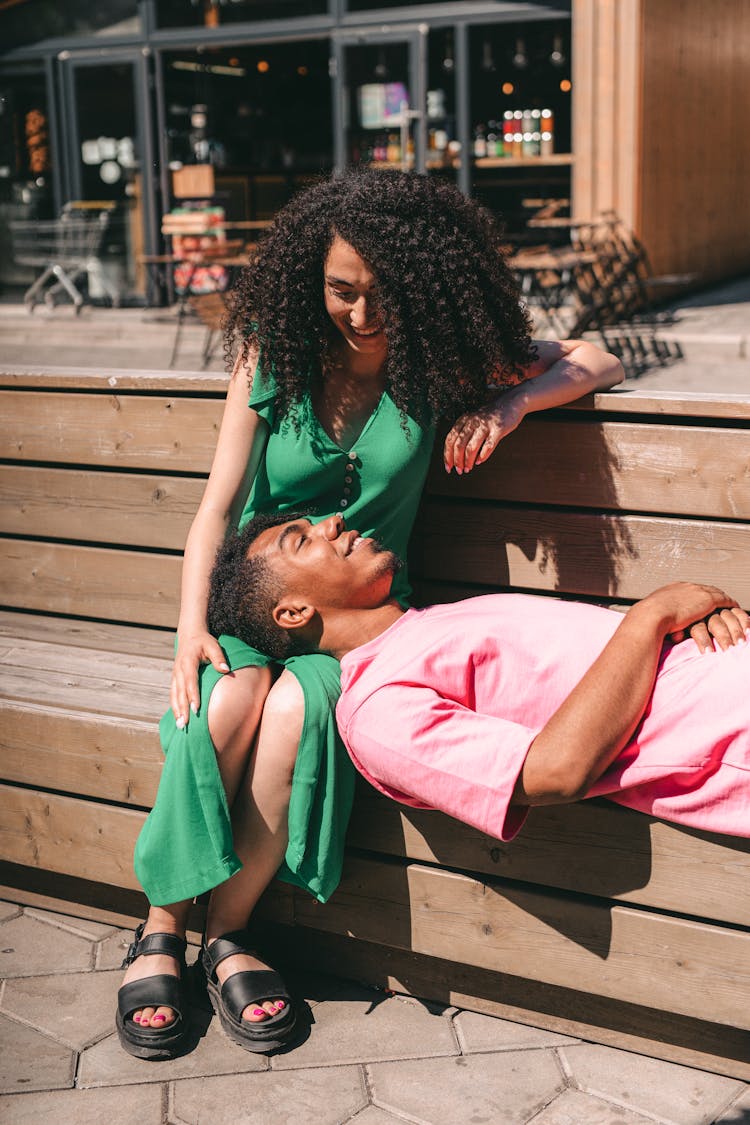 Man Lying On The Woman's Lap 