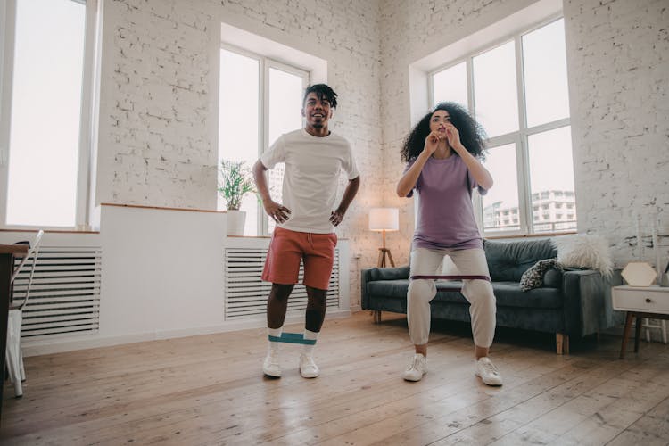 
A Couple Exercising Indoors