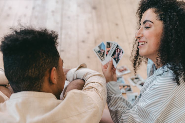 Couple Looking At Their Photos 