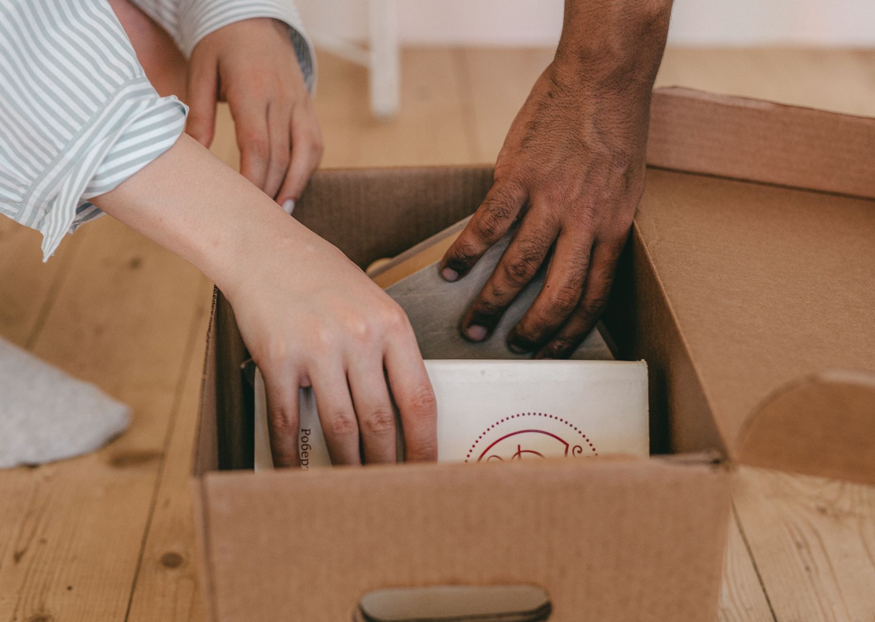 Professional removals crew at work — storage & moves to storage Weybridge