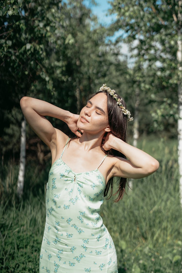 Woman In Green Spaghetti Strap Dress