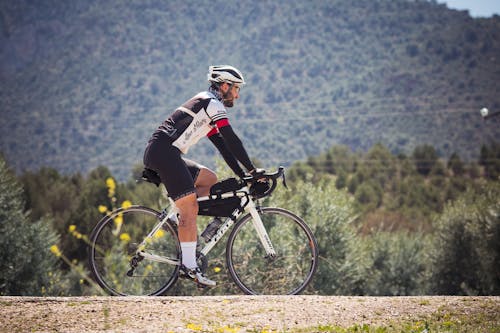 Základová fotografie zdarma na téma cyklista, hora, jízda