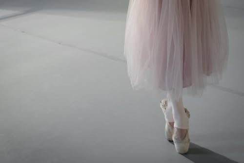 A Ballet Dancer Standing On Her Toes