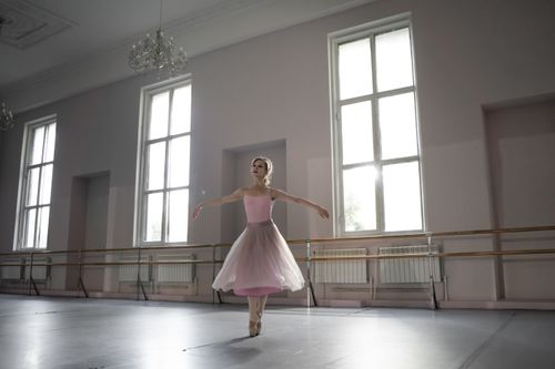 Woman Dancing Ballet In A Studio · Free Stock Photo