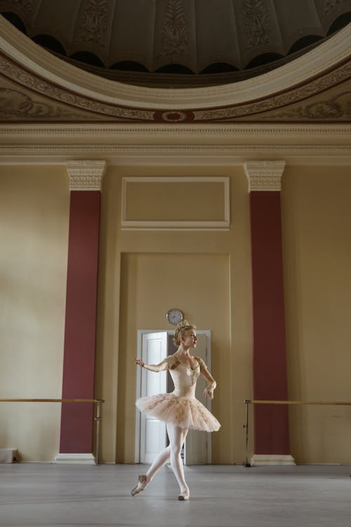 Ballerina Dancing Inside an Empty Room