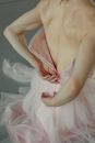 Woman Zipping her Dress