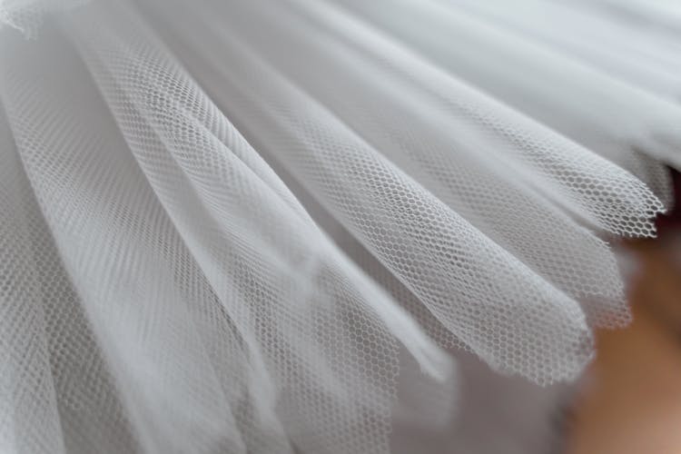 White Tulle Fabric In Close-up Photography