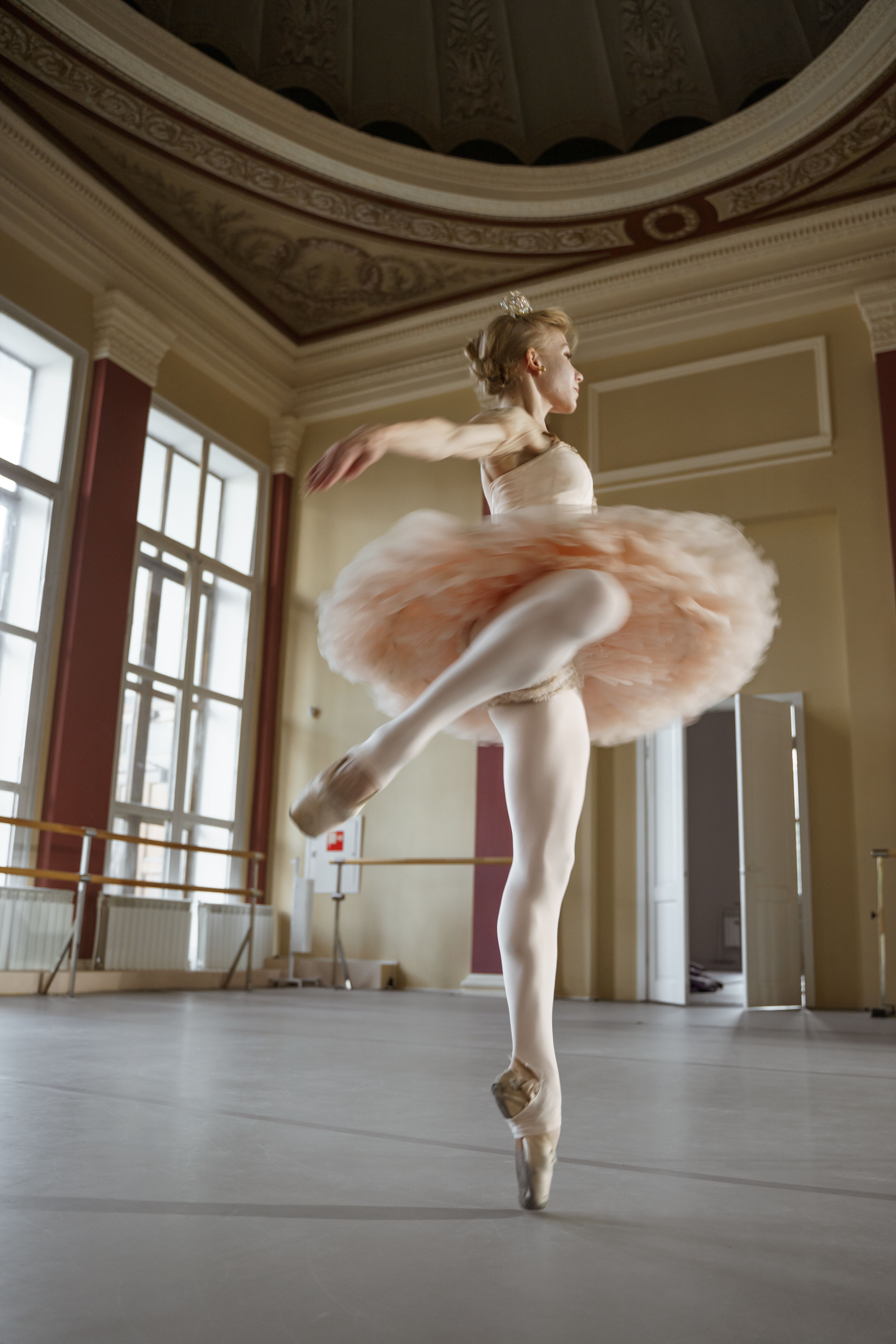 Ballerina Dancing in a Studio · Free Stock Photo