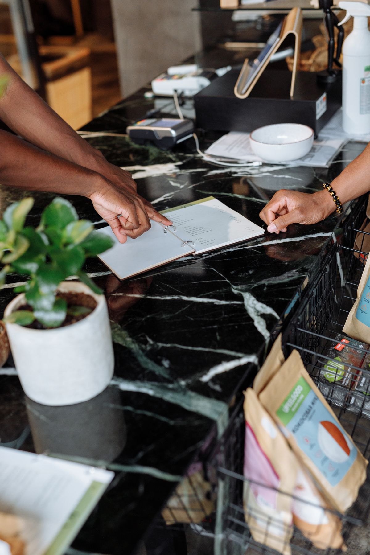 Customer being helped at a digital service counter