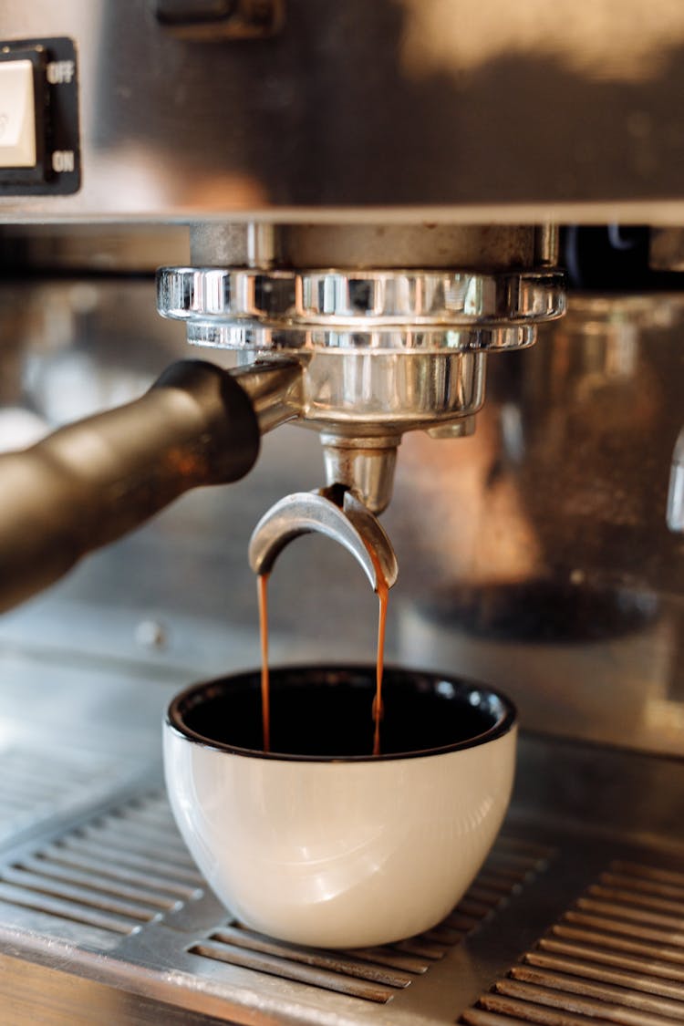 Brewing Coffee Into A Cup