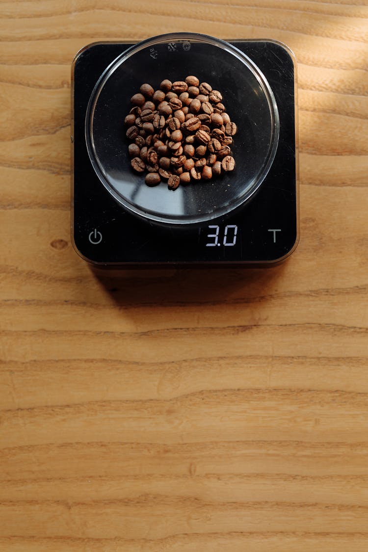 Coffee Beans In A Weighing Scale 