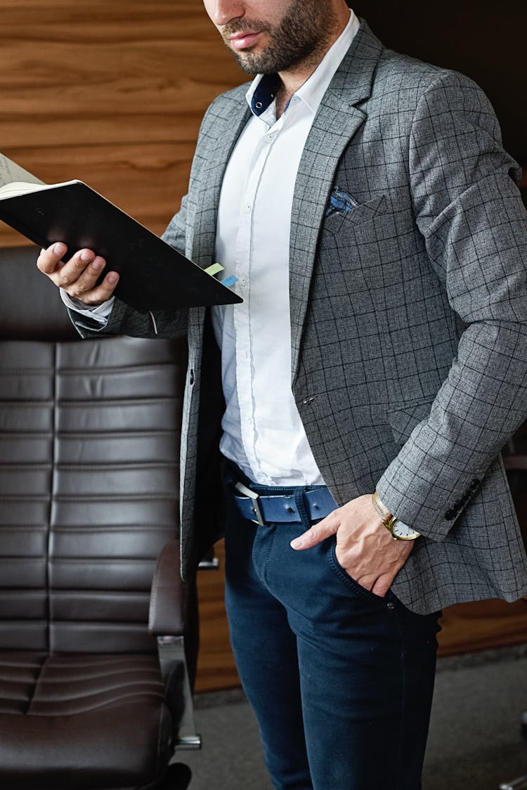 Handsome Man Reading A Book