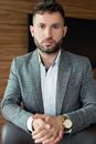 Handsome Man in Gray Plaid Suit Jacket With Facial Hair