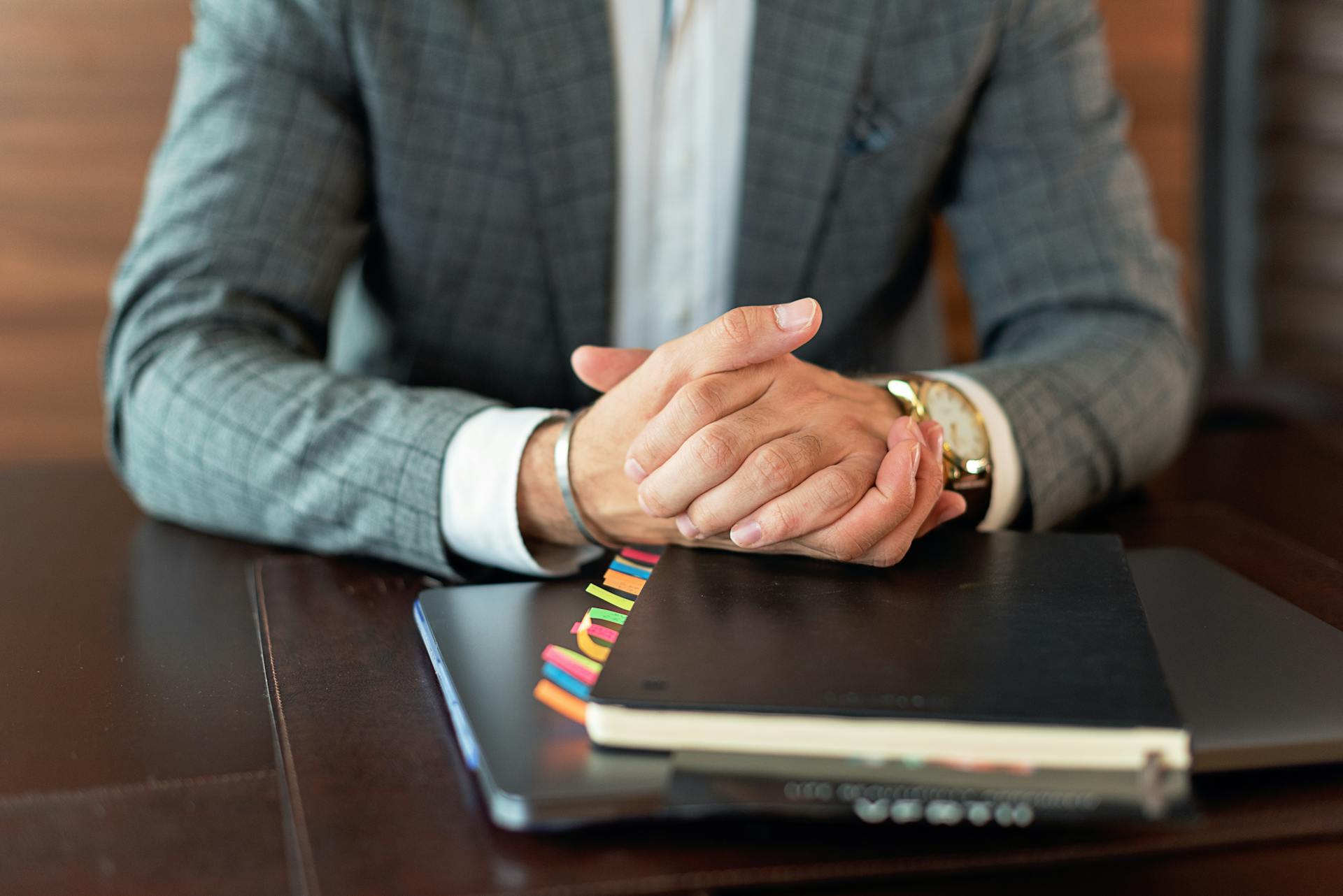 A Businessman Sitting on His Desk