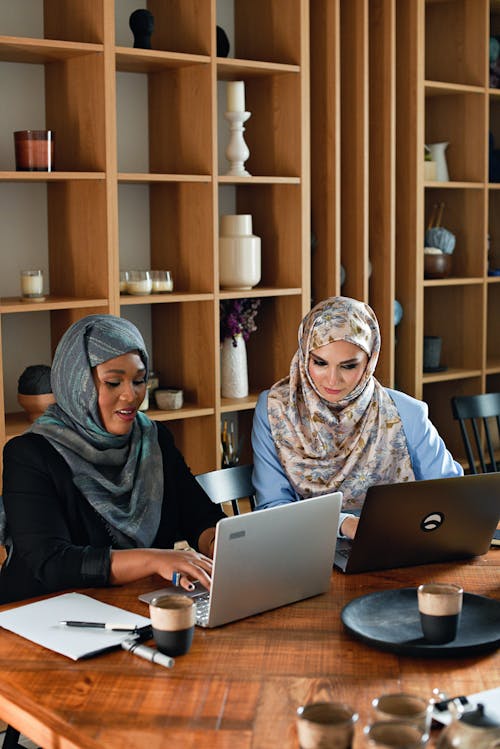 Women Working on their Laptops