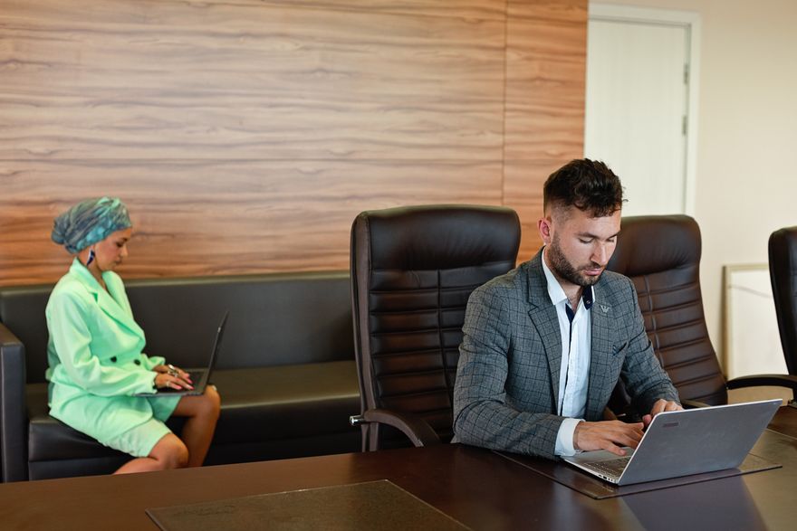 Two Tsuzuki recruiters reviewing a candidate film together — photo by Mikhail Nilov on Pexels