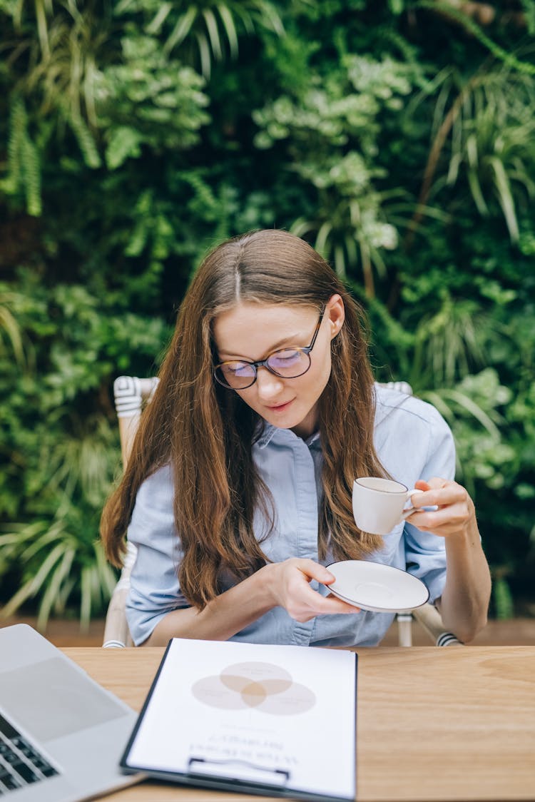 A Businesswoman Reading A Document 