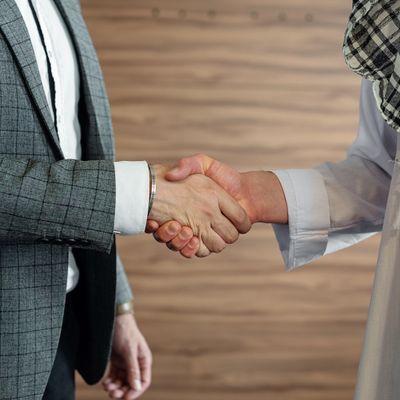 A warm business introduction and handshake