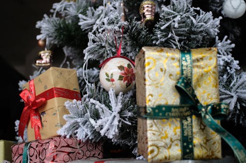 Christmas Presents Near a Frosted Christmas Tree