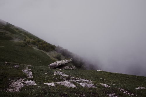 Free Explore the mist-covered hills and rocky terrain of Kislovodsk, Russia, creating a moody landscape. Stock Photo