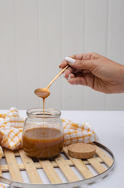 Hand Holding a Spoon 