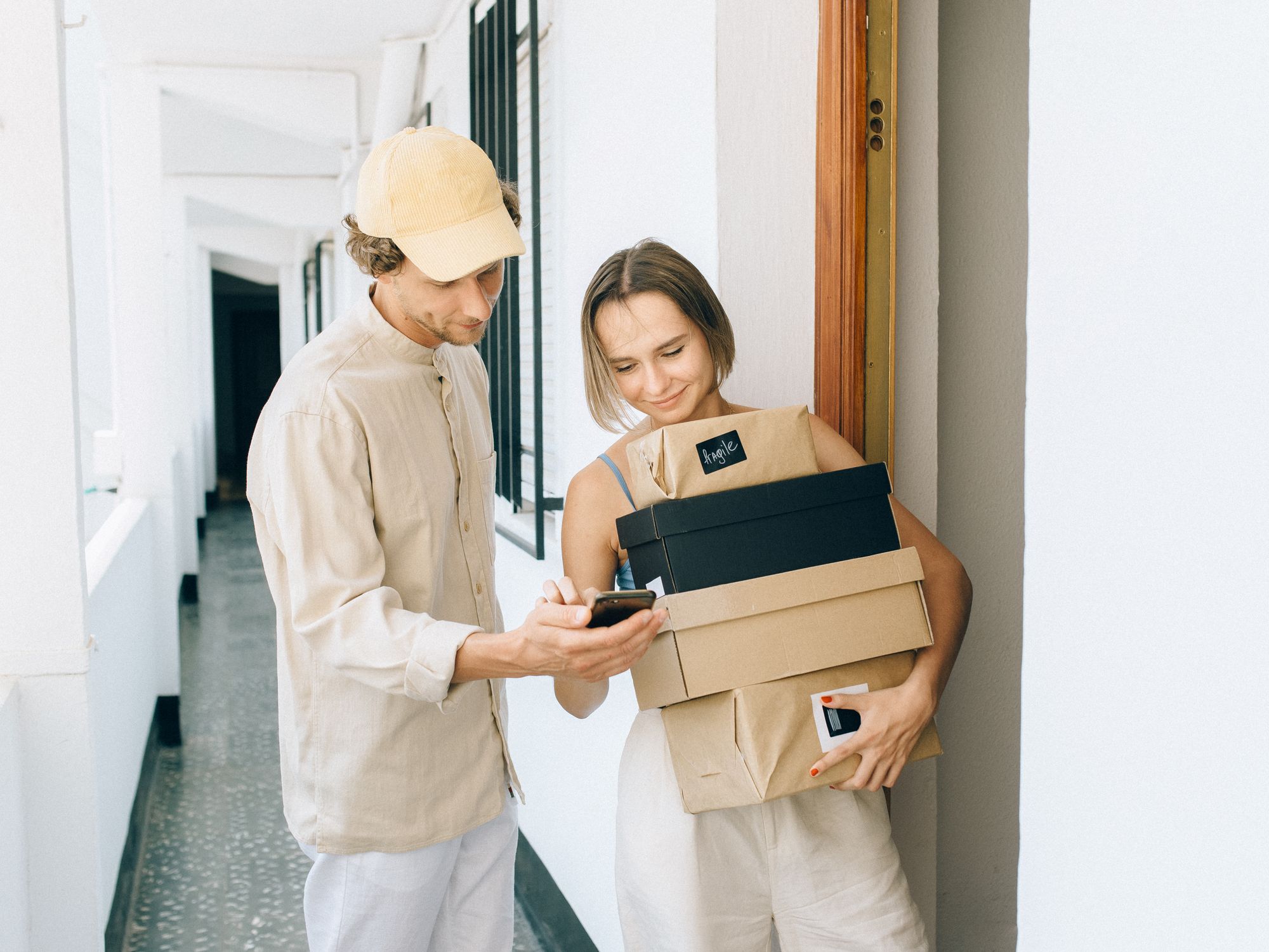 Flat Removals in Penysarn, Wales — movers carrying boxes for a flat move