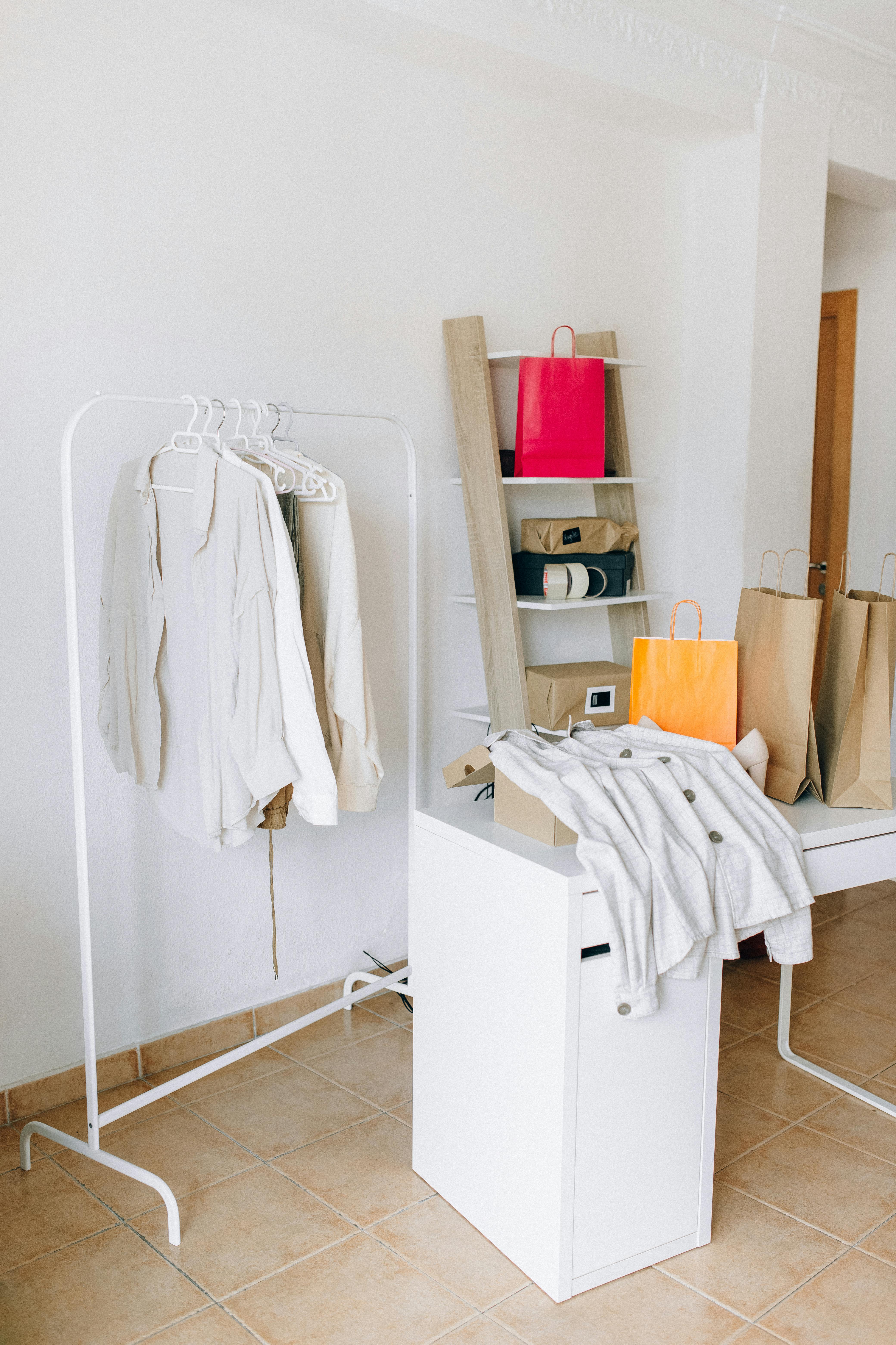 white textile on white wooden table