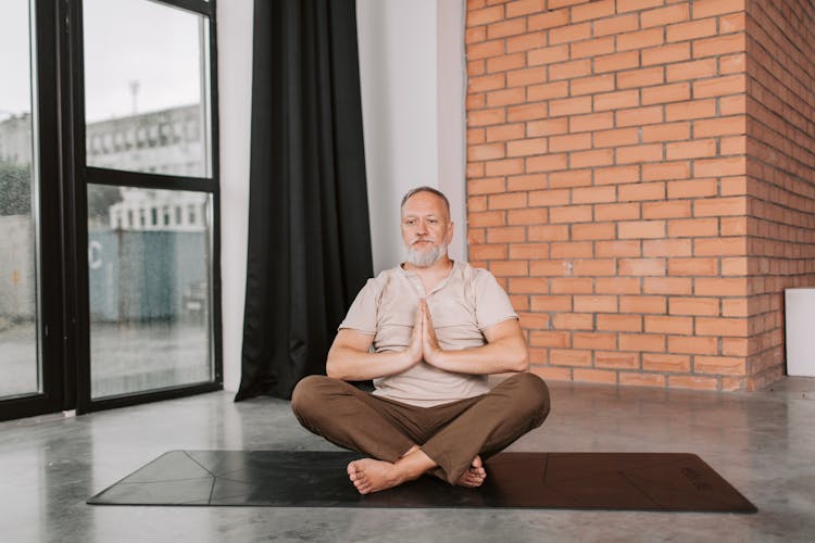 Elderly Man Doing Yoga