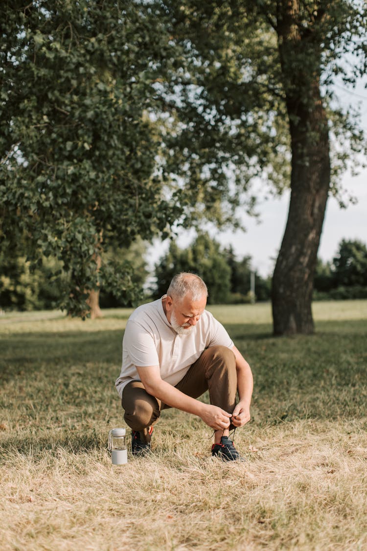 Elderly Man Tying His Shoelaces