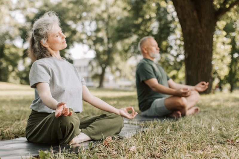 Couple meditating together