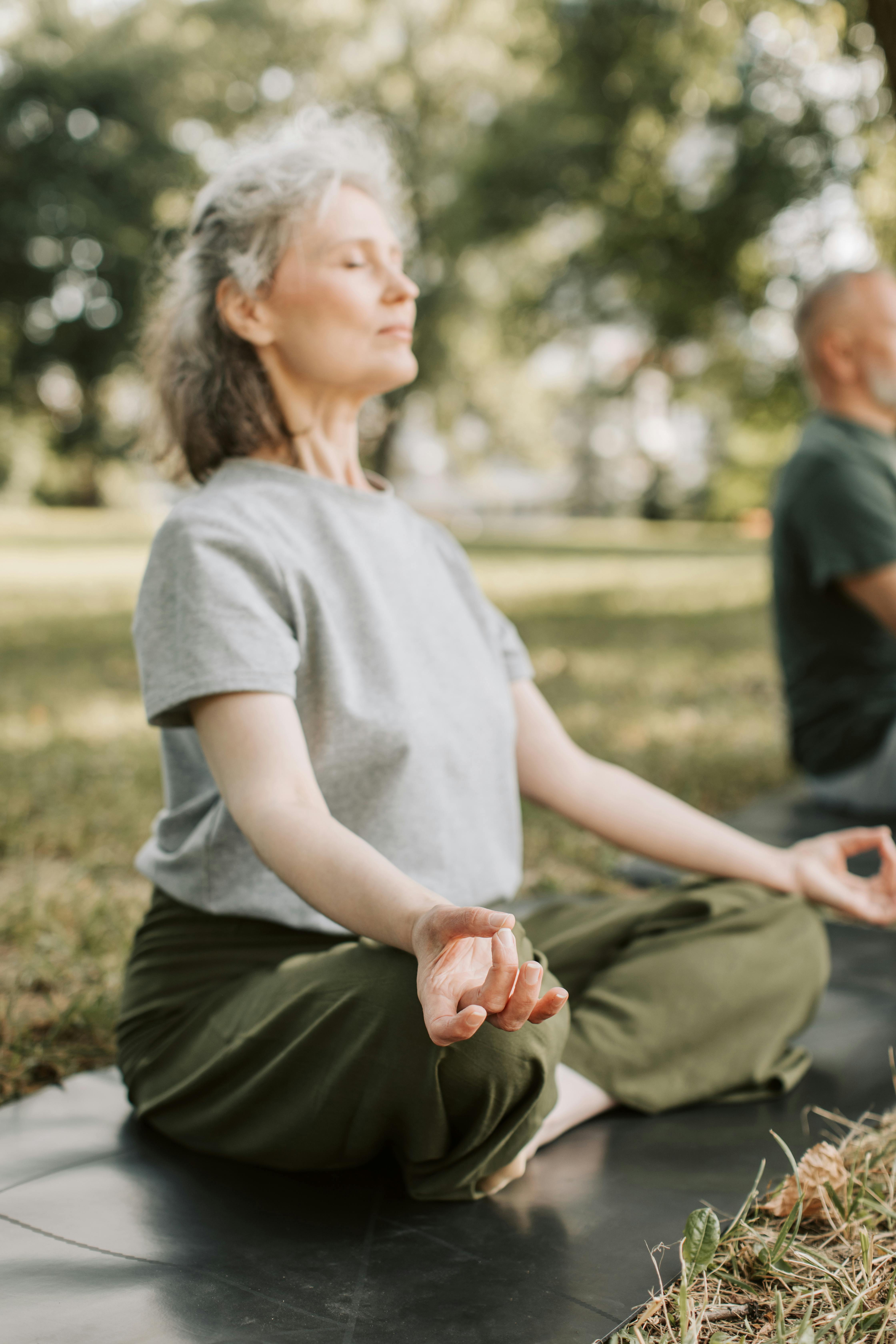 middle-aged woman doing yoga - Stock Image - F003/8654 - Science