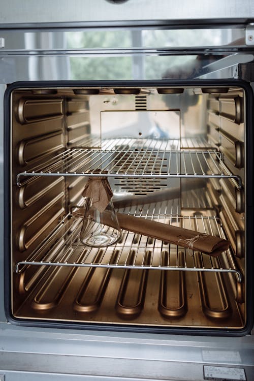 A Flask Standing in a Laboratory Oven 