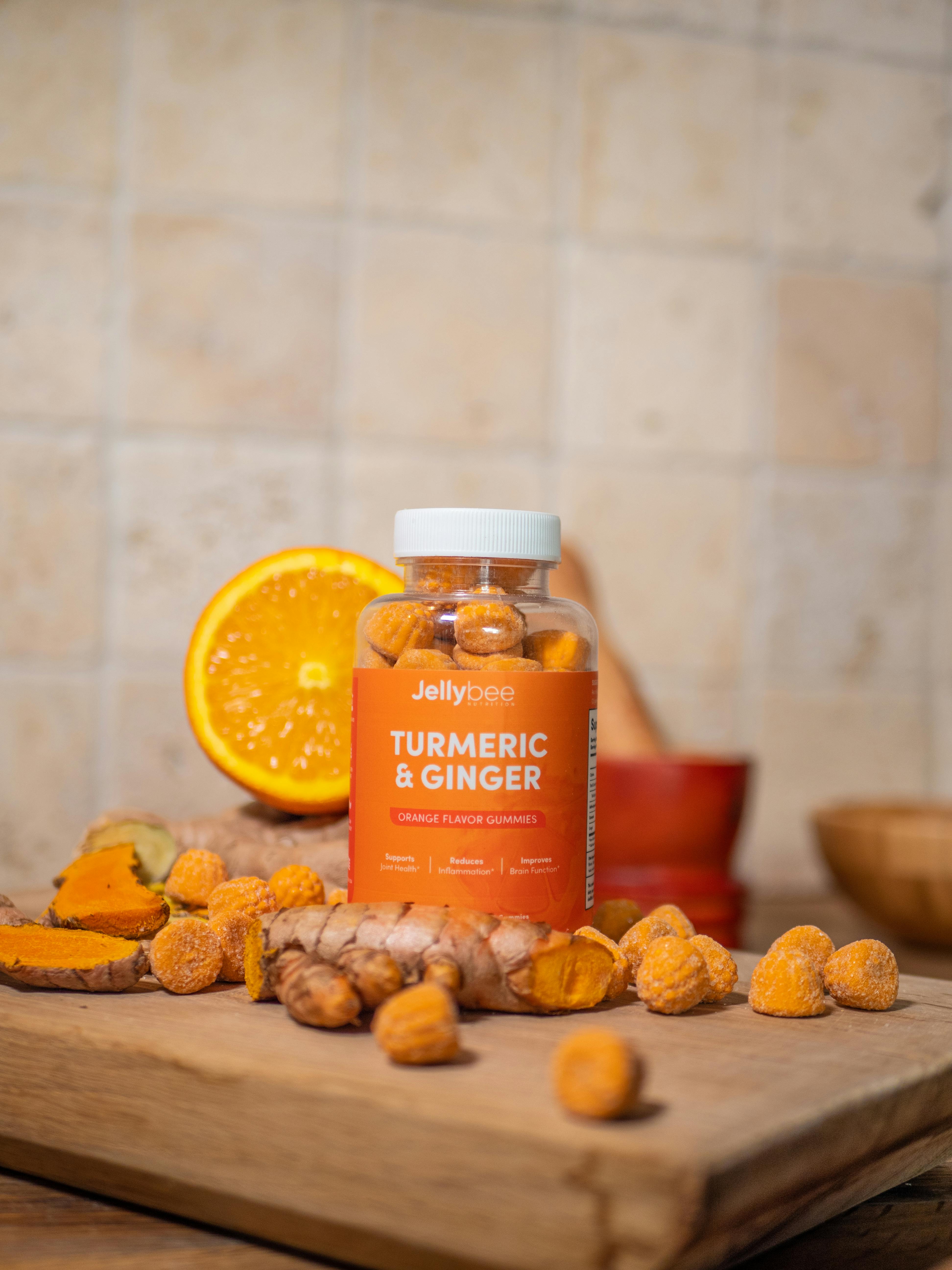 orange plastic bottle on wooden table