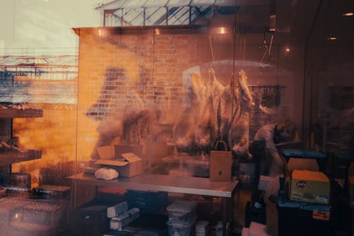 Man Working at Butchers