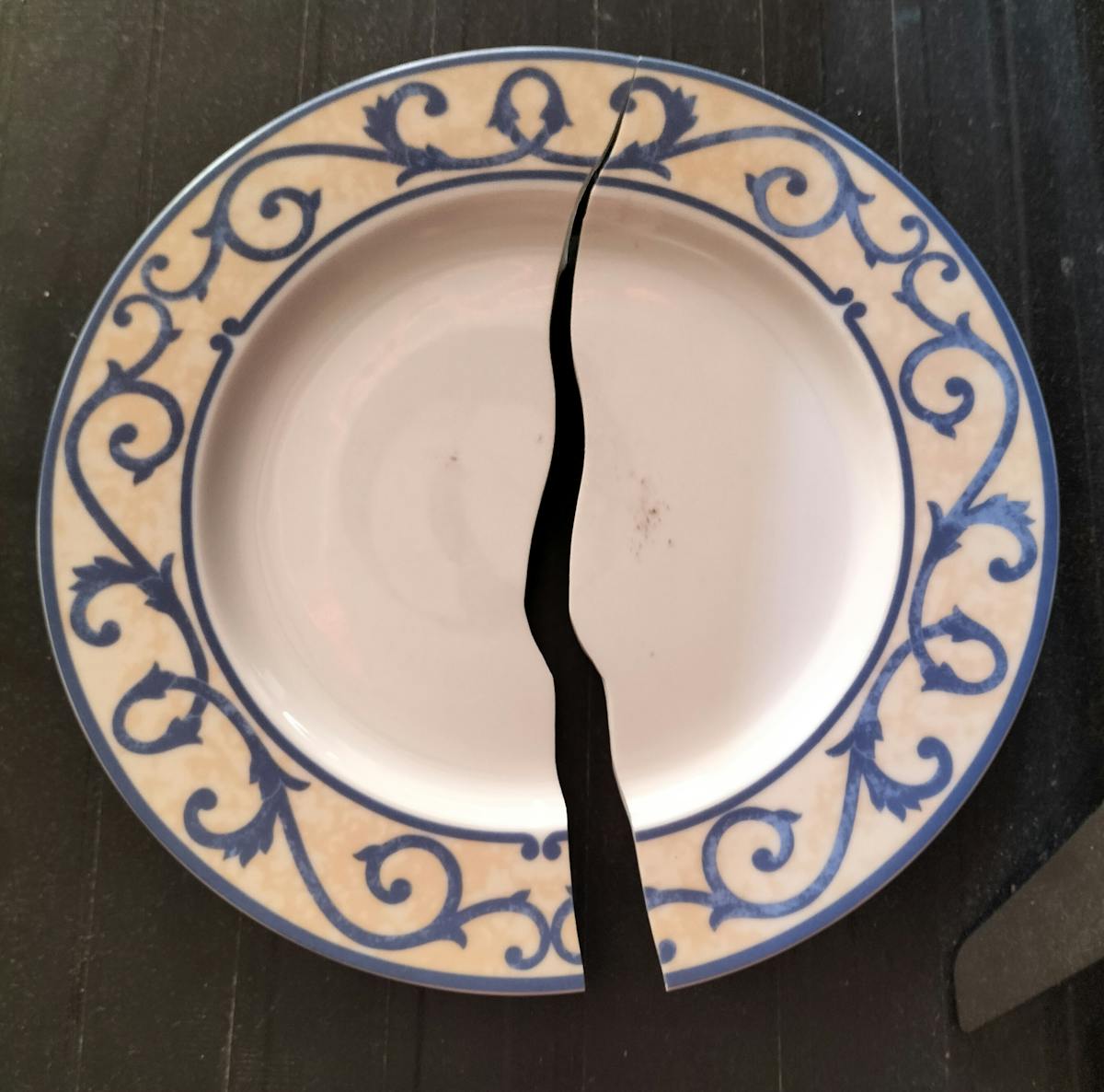 Graph on laptop screen showing rising trend line for digital audio metrics