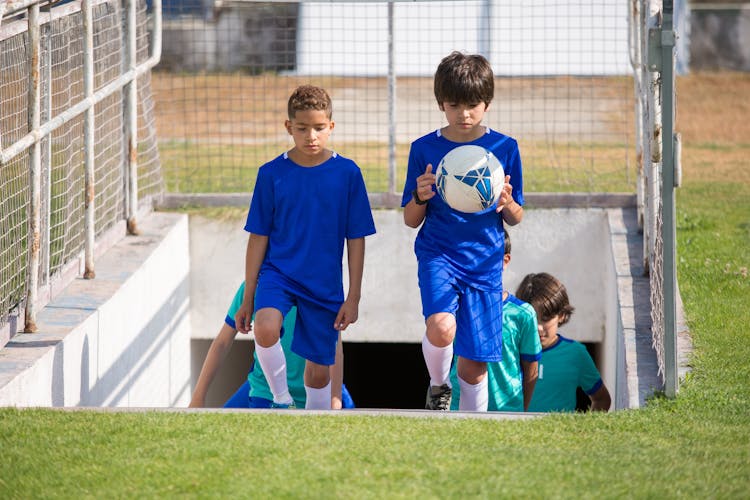 Children Walking Up The Stairs