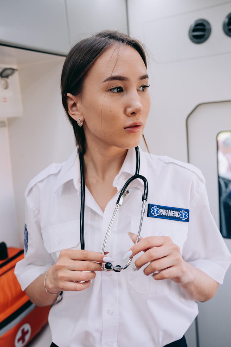 A Paramedic Inside An Ambulance