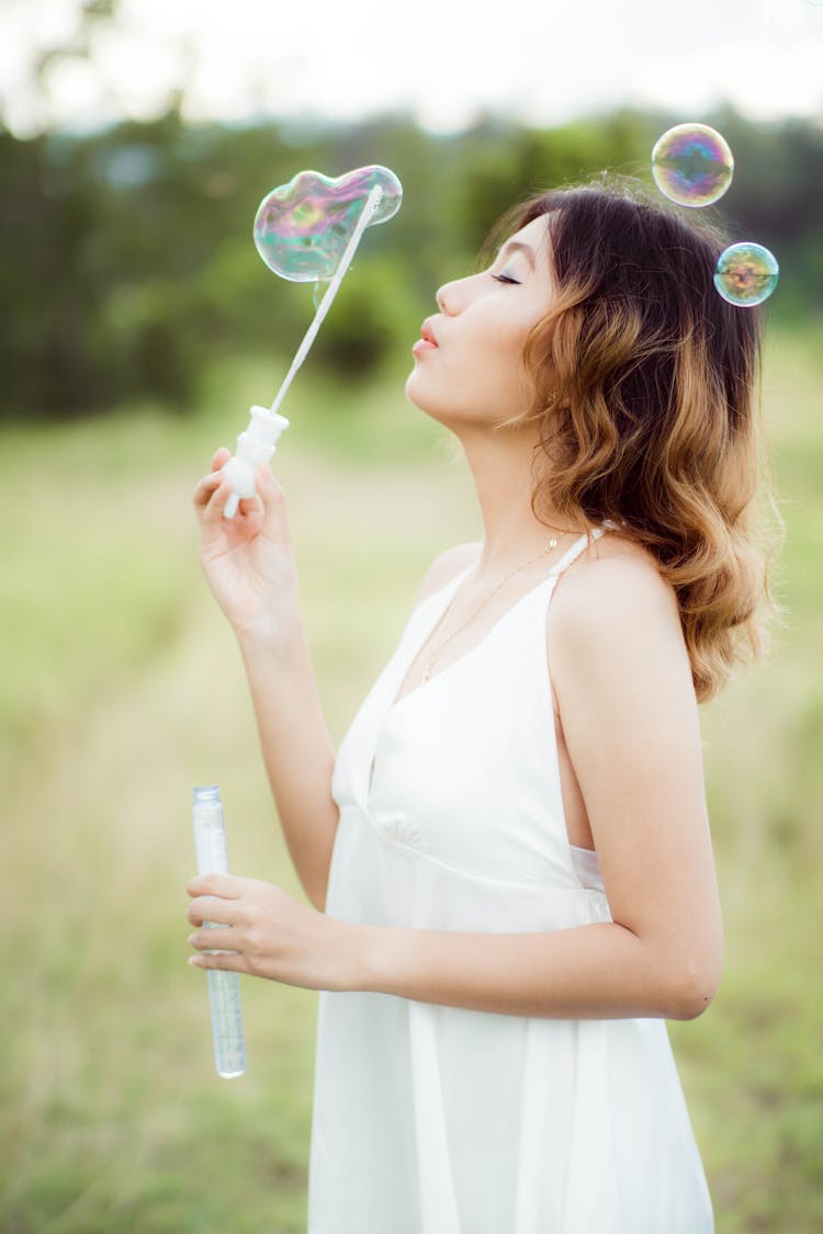 Woman Blowing Bubbles