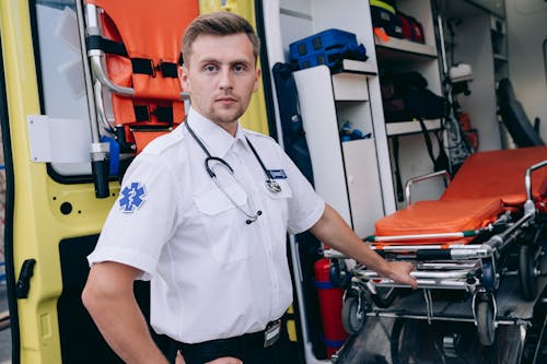 A Paramedic Holding a Stretcher