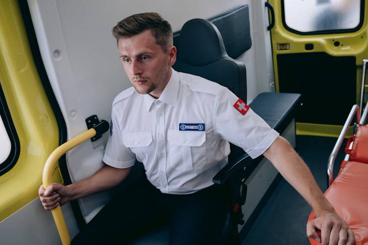 A Paramedic Inside An Ambulance