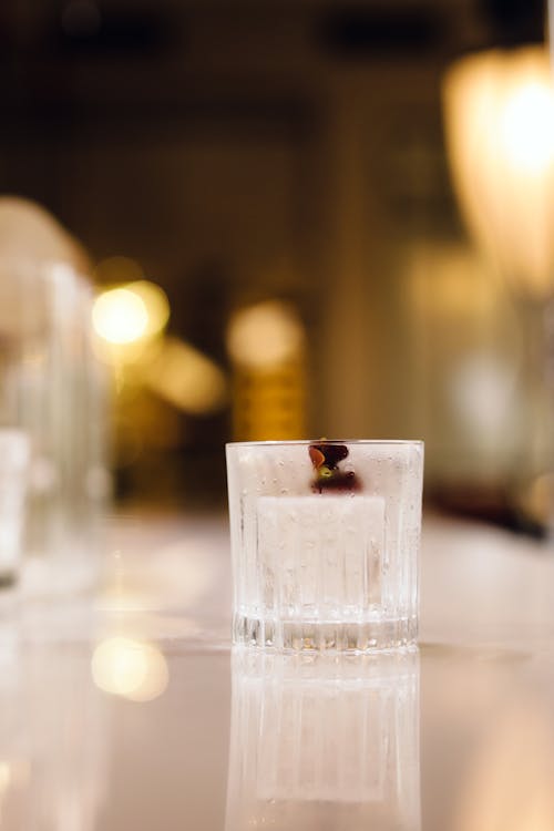 Close Up Photo of Ice Cube in a Glass