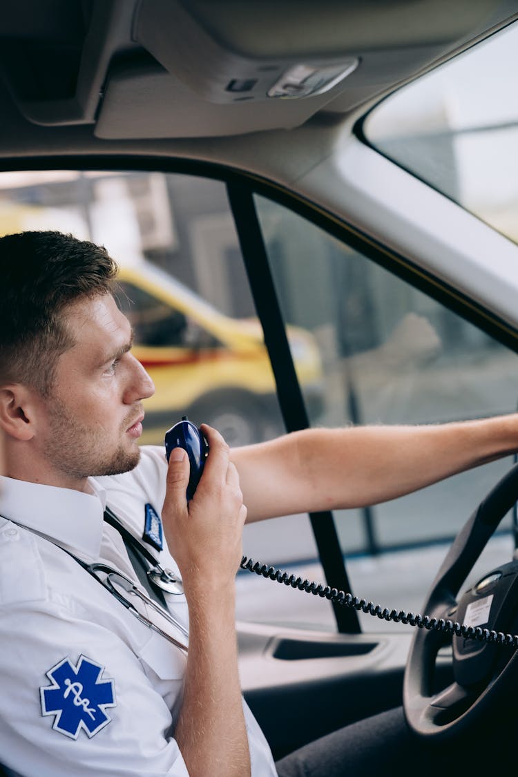 Man Driving An Ambulance