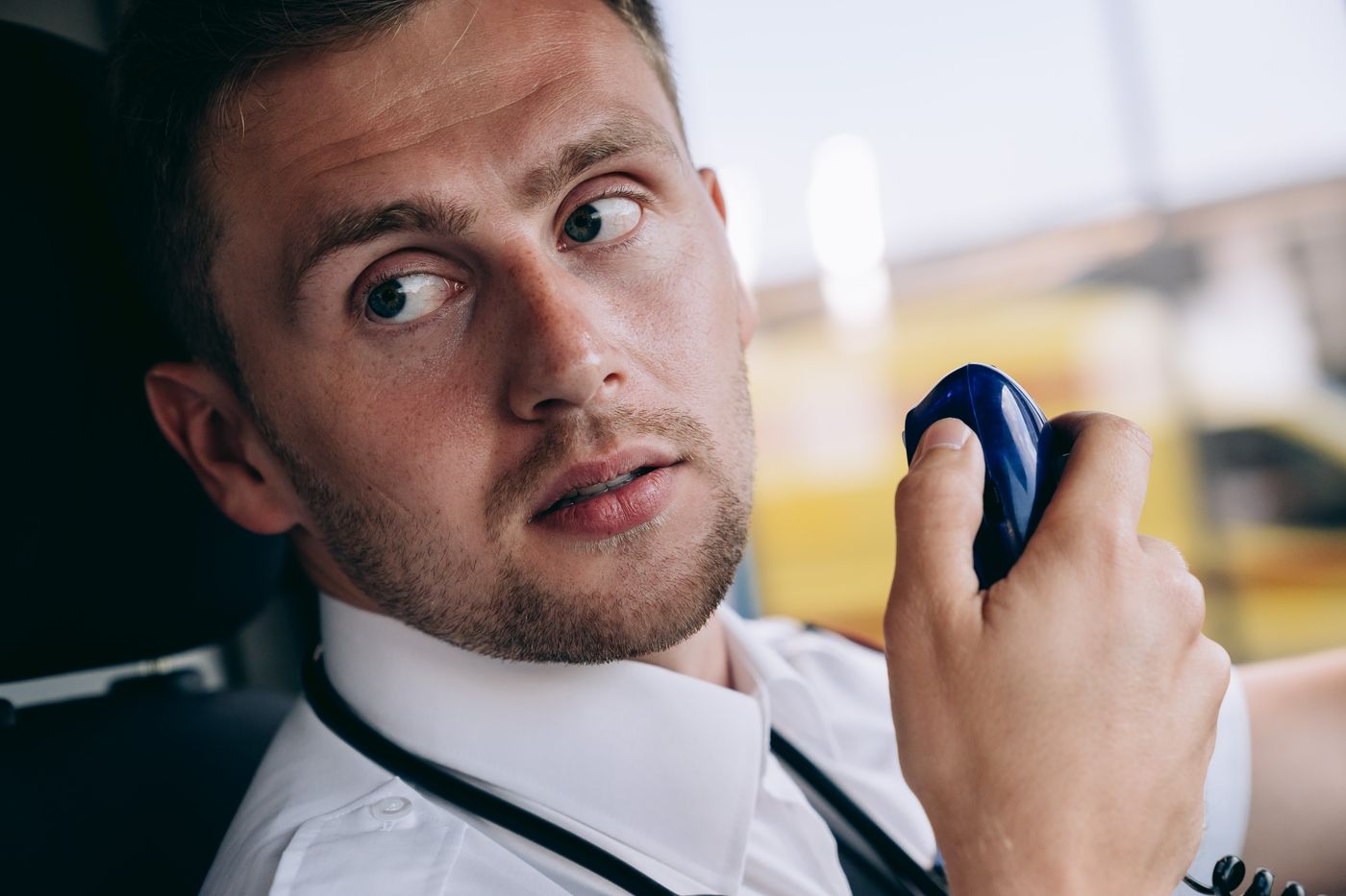 Security officer using a two-way radio