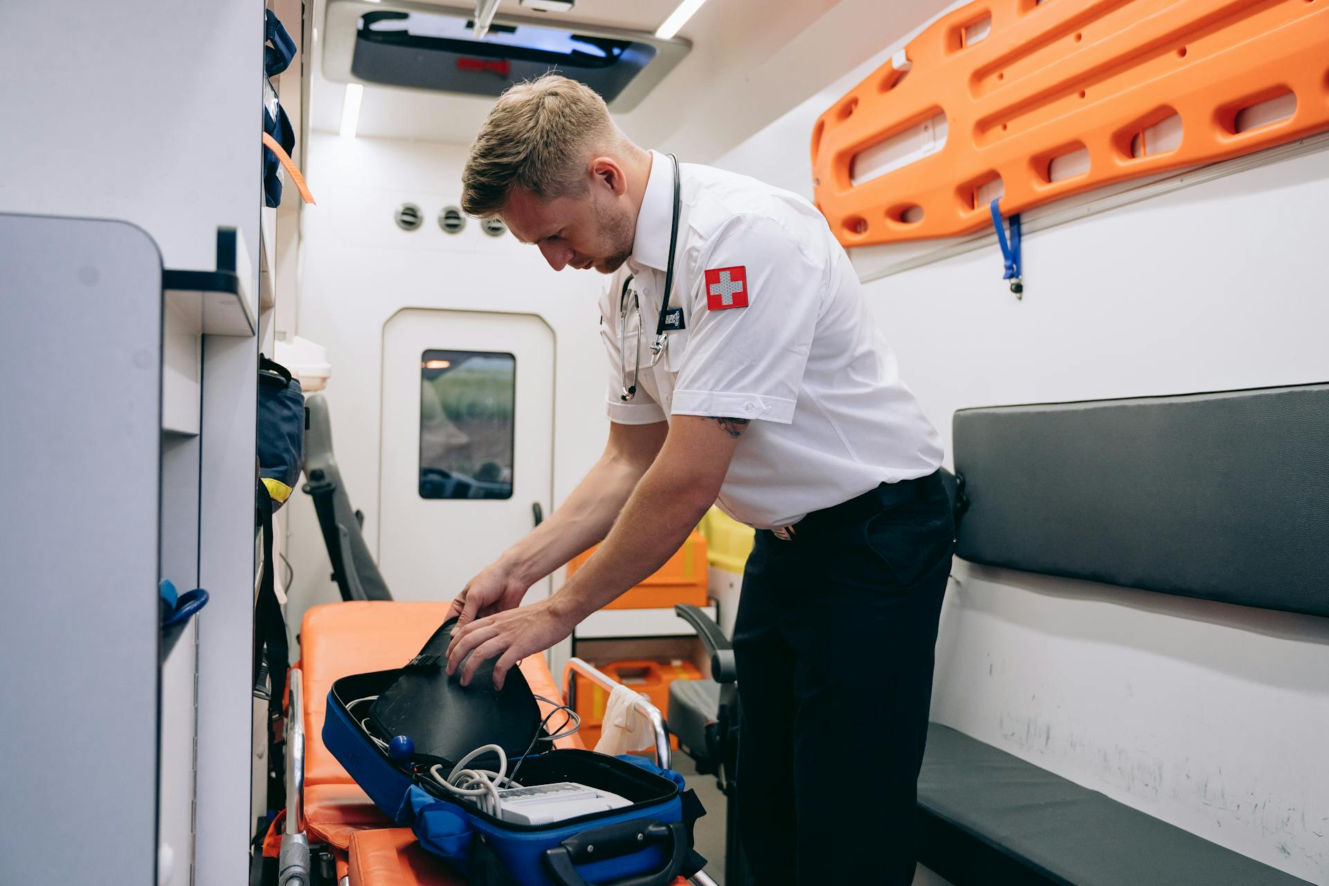 Medic Holding a Medical Equipment