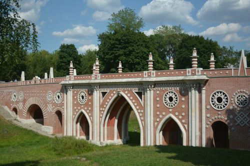Free Ornate brick bridge with intricate arches in Tsaritsyno Park, Moscow. Stock Photo