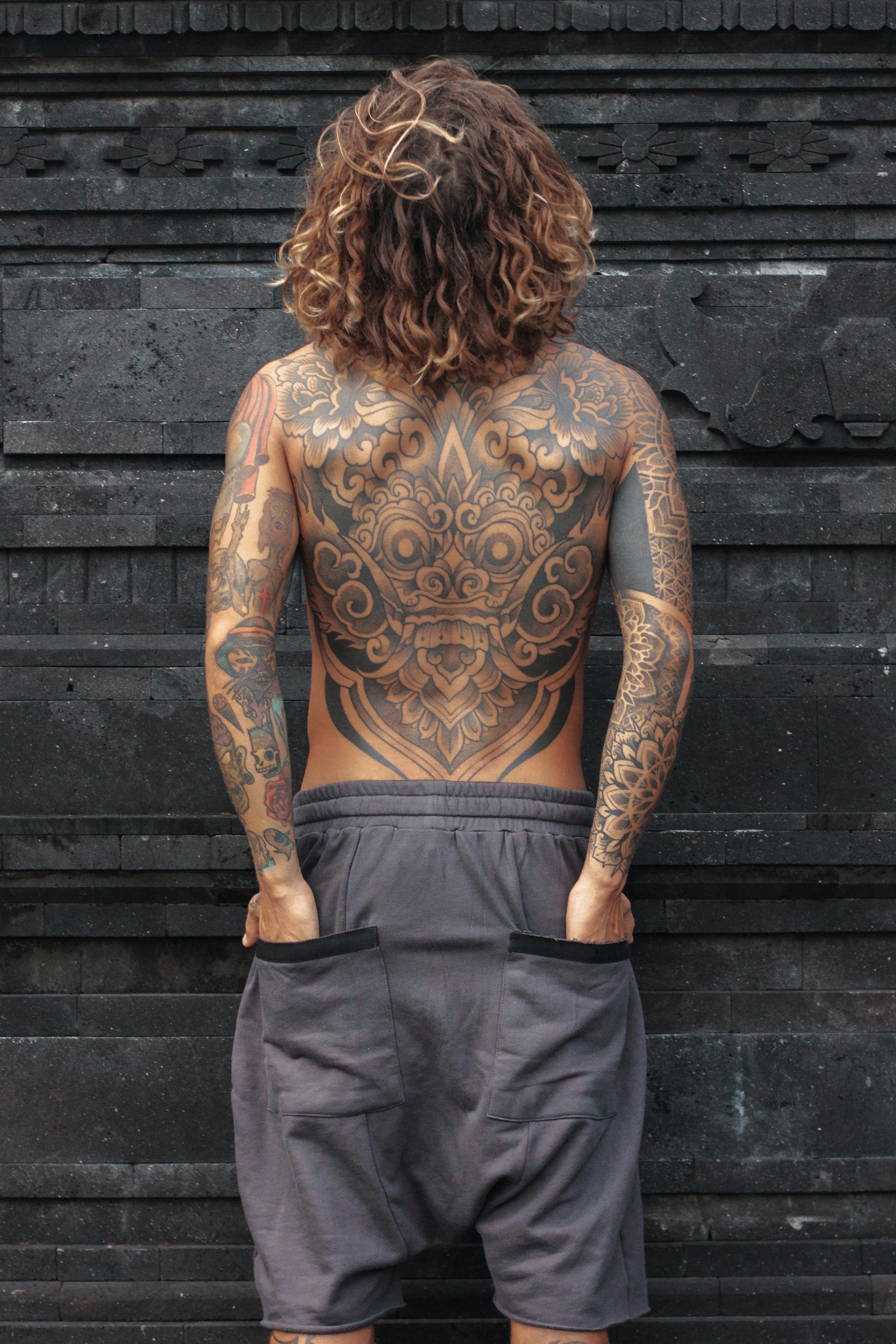 Vertical Back Tattoos Men