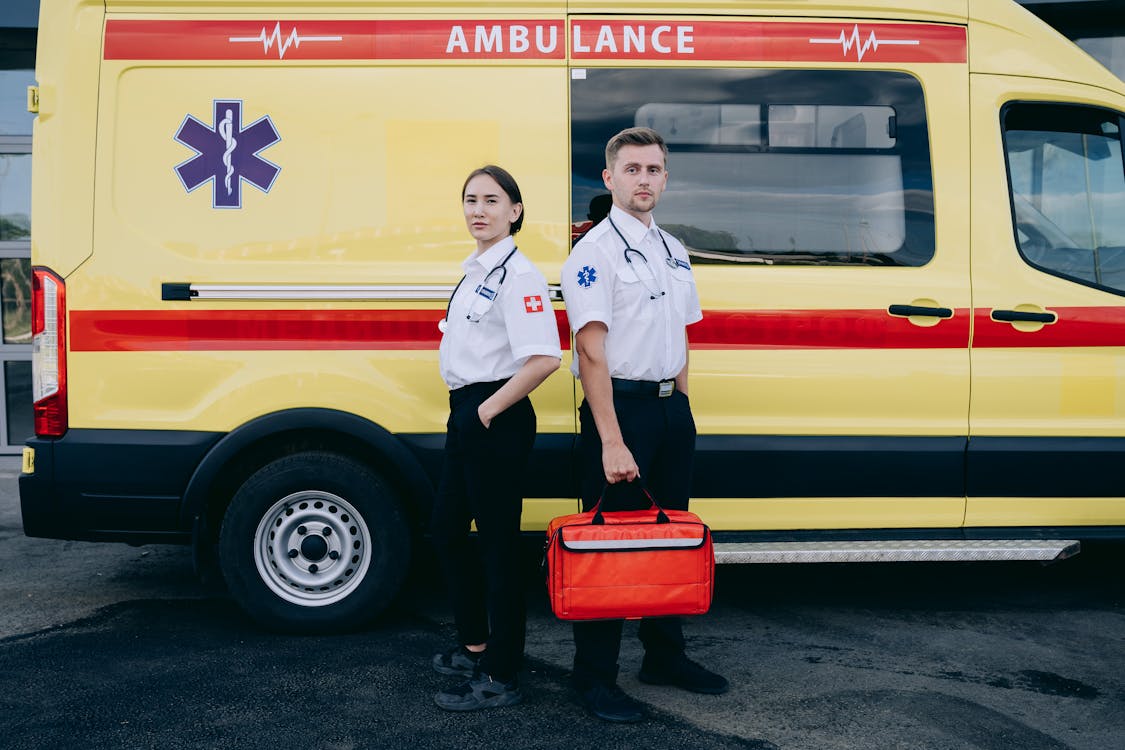 Two EMS services persons