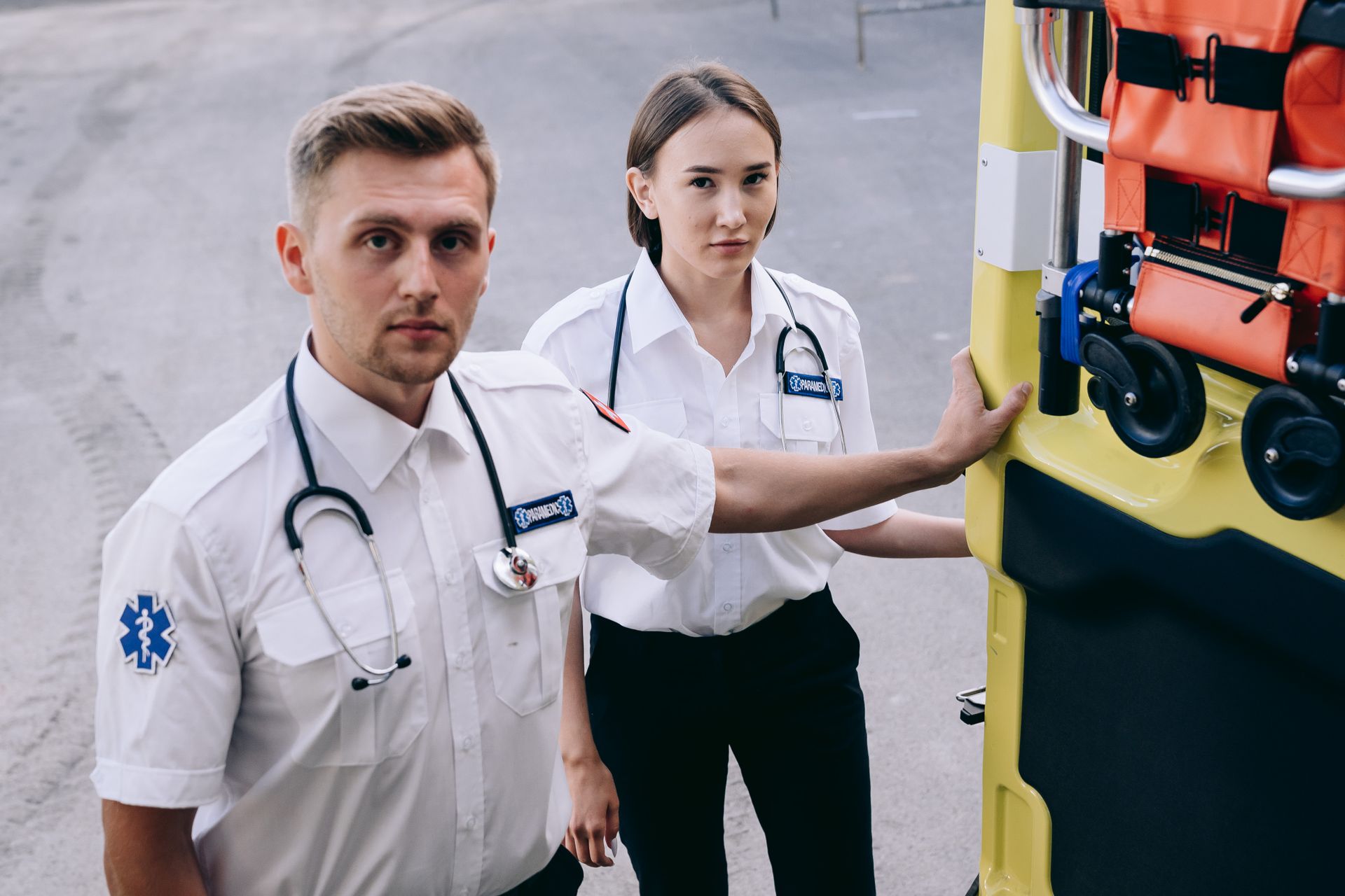 Paramedics Standing by an Ambulance